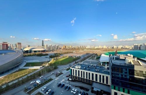 Yesil District Apartment | Вид на Ботанический сад и Астану Арену! Рядом Барыс Арена и Велотрек , мед объекты столицы!