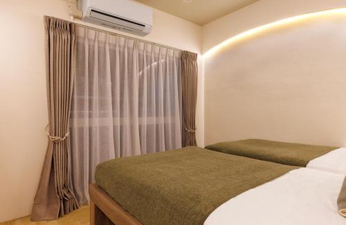 Yonabaru Apartment | オーシャンビュー窓から見える景色を想い出にThe琉球タワー10A