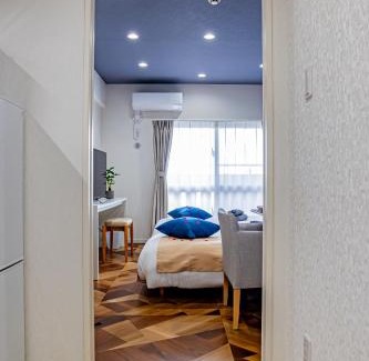 Yonabaru Apartment | オーシャンビュー窓から見える景色を想い出にThe琉球タワー10B