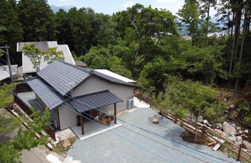Minamiaso House | 【コテージくぎの】大谷川沿いの露天風呂があるコテージ
