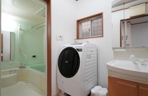 Higashikujo Kitakarasumacho Apartment | 京都佳月民宿