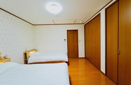 Higashikujo Kitakarasumacho Apartment | 京都佳月民宿