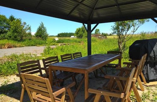 Furano House | 大人数の家族旅行に！BBQ/シアタールーム/カラオケ/日本庭園