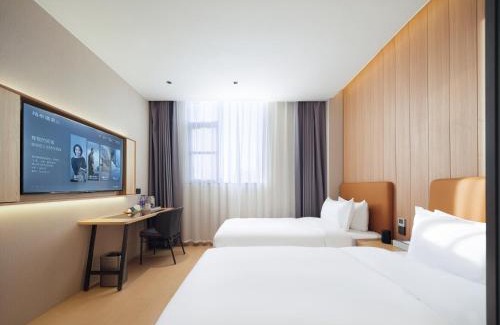 Guancheng Hui District Hotel | 桔作酒店（郑州经开中原福塔东地铁站店）