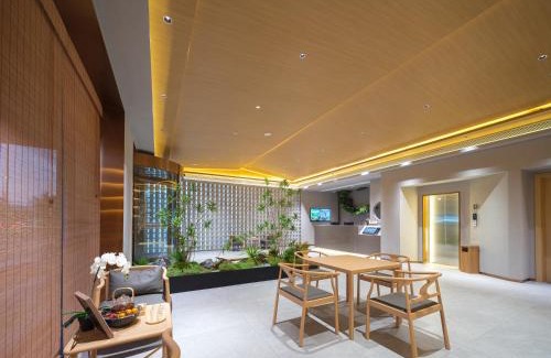 Guancheng Hui District Hotel | 桔作酒店（郑州经开中原福塔东地铁站店）