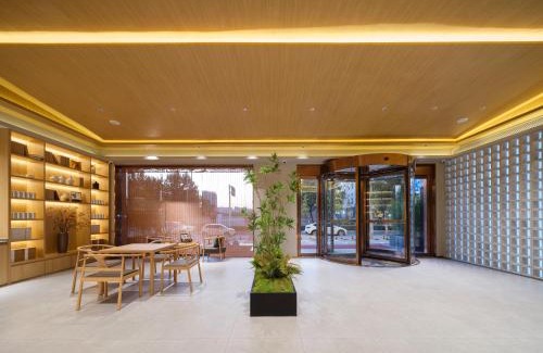 Guancheng Hui District Hotel | 桔作酒店（郑州经开中原福塔东地铁站店）
