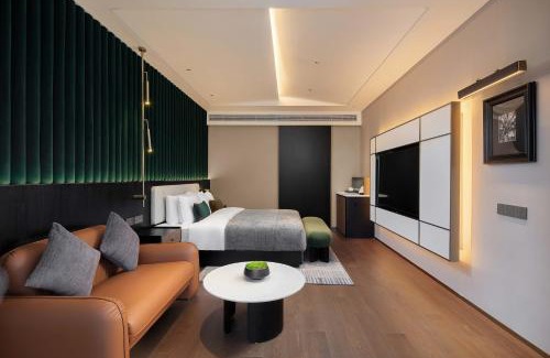 Huangshigang District Hotel | 黄石未苏湾花间亭飞花