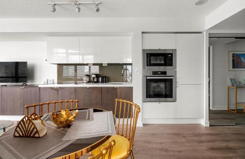 CityPlace Apartment | 1 Bd with a Romantic View of Trains in Downtown