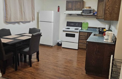 Prince George House | 10 minute walk to the hospital! Cozy home in a quiet area near many amenities.