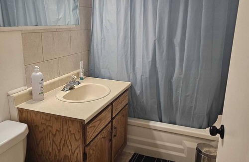 Prince George House | 10 minute walk to the hospital! Cozy home in a quiet area near many amenities.