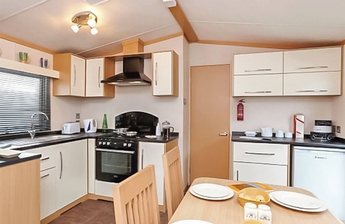 Wigton House | 12ft-wide caravan with one double and one twin.