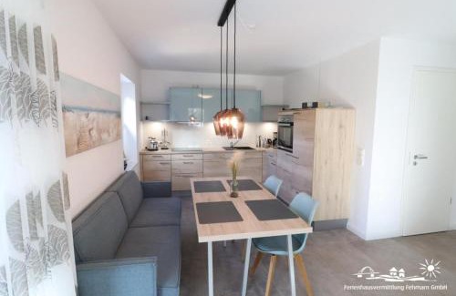 Landkirchen House | 15 Ferienwohnung Inselschatz mit Wallbox