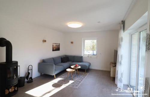 Landkirchen House | 15 Ferienwohnung Inselschatz mit Wallbox