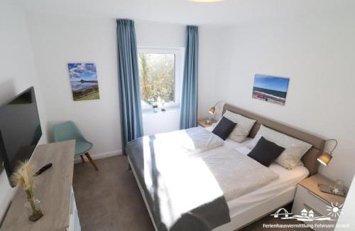 Landkirchen House | 15 Ferienwohnung Inselschatz mit Wallbox