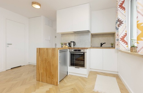 Powisle Apartment | 15th Floor Studio in Warsaw by Renters