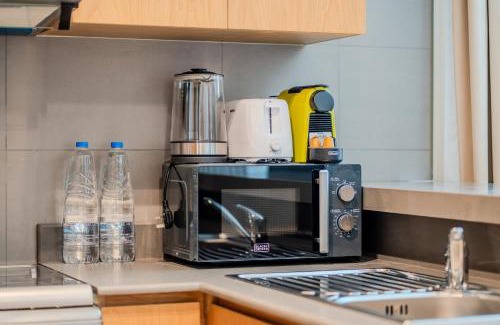 Sharjah Apartment | 1BR The Golden Souq by Blue Cloud Holidays