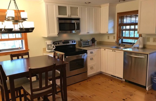 Eel Point Cottage | 2 Bed/2 Bath on 1/4 acre w/fenced yard, short walk to 40th thru rolling dunes.