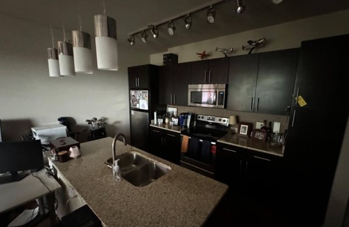 Dallas-Fort Worth Metroplex DFW Apartment | 2-bedroom apartment fiber WiFi in Addison. Set up for remote computer work.