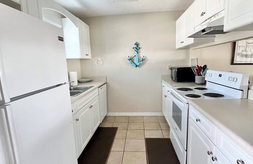 Sugar Beach House | 2 BR Gulf Front Complex - Heated Pool - Ask about SNOWBIRD DISCOUNTS!