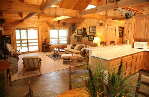 Eureka Springs Cabin | 2 story log cabin on 50 acres. Large fireplace, hot tub, covered porch.