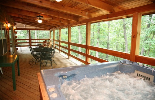 Eureka Springs Cabin | 2 story log cabin on 50 acres. Large fireplace, hot tub, covered porch.