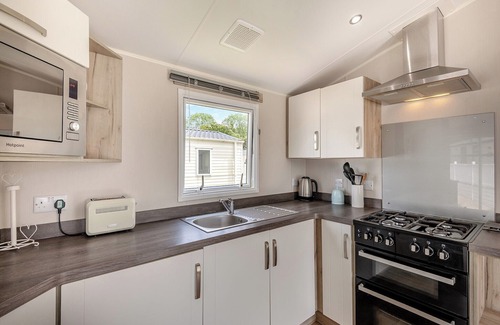 Westmarsh House | 2018-2020: 12ft-wide caravan ideal for small families with one double and one twin.
