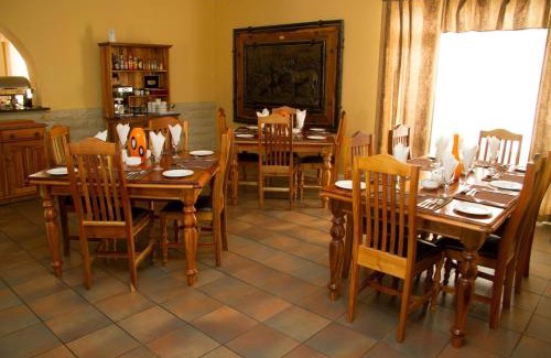 Komani House | 26 On Chamberlain Guest House