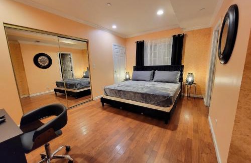 Pico - Robertson Apartment | 3 bedroom guest suite first floor unit with nice patio area right next to the MrC Hotel 10 minutes from Rodeo Drive Washer Dryer WIFI and more