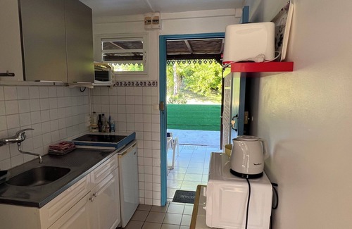 Le Gosier Apartment | 3 min from the beach! Lovely single-storey Ixora rental with terrace and balcony