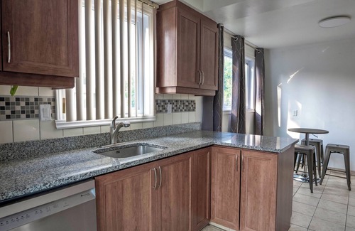 Laval-des-Rapides Apartment | 3BR 6Beds 5min Walk distance to Metro, Free Parking, next to Place Bell AC