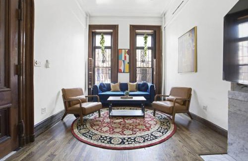 East Harlem Apartment | 3BR NYC Brownstone Game Room Backyard Patio