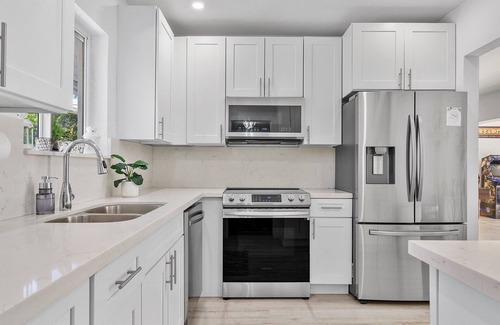 North Miami House | 4BR Oasis w/heated pool & arcade! Pet friendly, groups, couples & families!