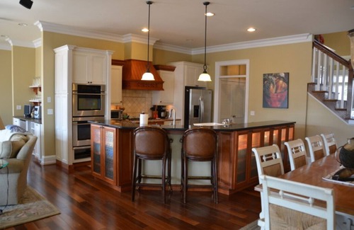 Heron Harbour Isle House | 5-6BR, 5BA in Bayside Retreat with Community Pools & Boat Slip