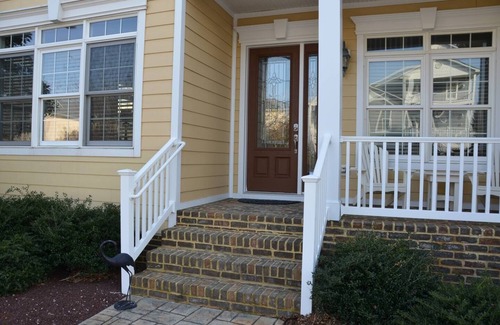 Heron Harbour Isle House | 5-6BR, 5BA in Bayside Retreat with Community Pools & Boat Slip