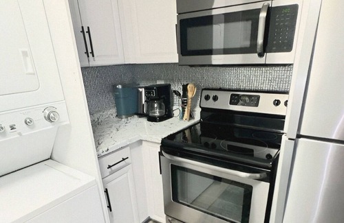 Anona Condo | 5 Min>Beach Remodeled 2 bed 2 Bath Condo With Pool and Grill and King bed!