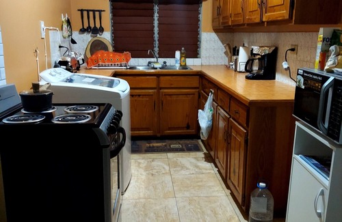 Mango Walk Apartment | 5 minutes to the beach! Cozy 2 Bedroom & Bathroom with balcony & scenic views