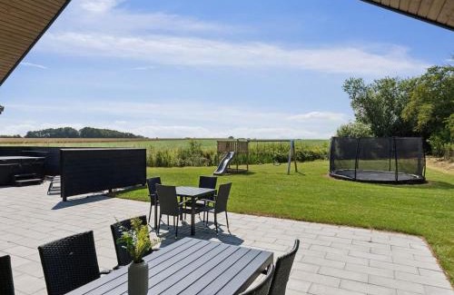 Hasmark Strand House | 5 star holiday home in Otterup