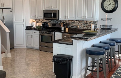 Northeast Virginia Beach House | 7 beds! One block from new SURF Wave Pool and beach! Bikes included!