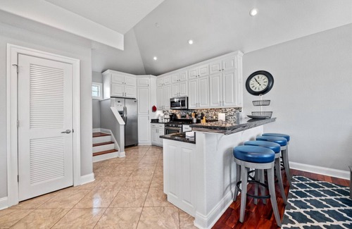 Northeast Virginia Beach House | 7 beds! One block from new SURF Wave Pool and beach! Bikes included!