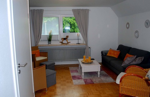 Dannewerk Apartment | 70 sqm for up to 4 people in Dannewerk Schleswig-Holstein. Car parking space and storage room for e-bikes, washing machine, full bathroom with bathtub, high chair and travel cot are available Bedding for the travel cot please bring your own.