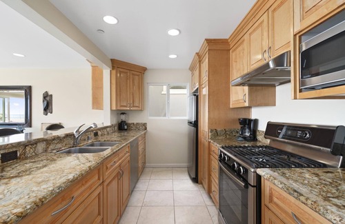 Balboa Peninsula Condo | 7BR Oceanfront Retreat | Coveted Pier-to-Pier Location | Walk to it All