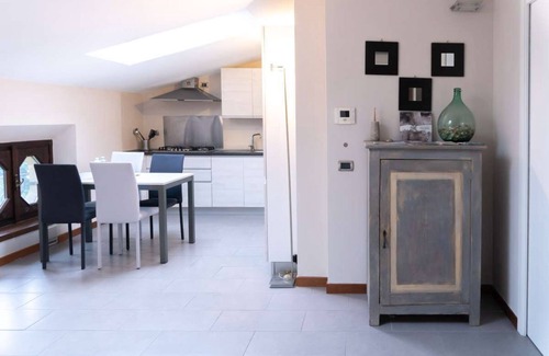 Tavernola Apartment | 80sm fully-equipped apartment on lakeside with garden, gazebo and private parking