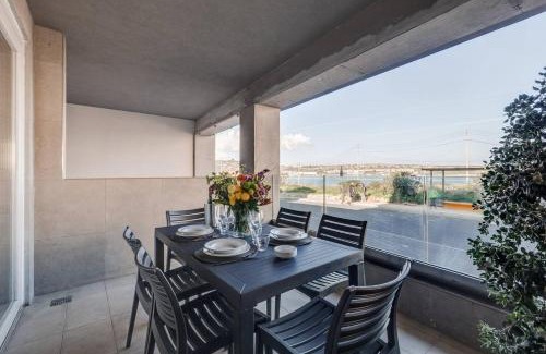 Għadira Apartment | 9ten11 Seafront By Homely