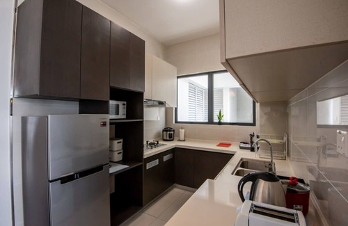 Johor Bahru Apartment | A Stylish 2BR Suite, Water Views, Free Parking