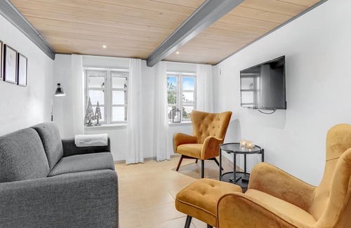 Sydals House | A unique gem of a vacation home located in a scenic setting right on the water.