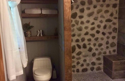 Burt Cabin | A warm relaxing couples retreat with all the comforts of home .
