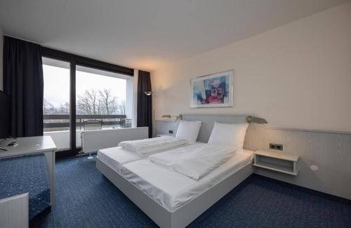Arnsberg Hotel | Adventure Into Arnsberg Forest From Pool Room With Pet Access
