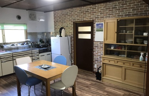 Asahikawa House | Airfield hill and patchwork hill valley house