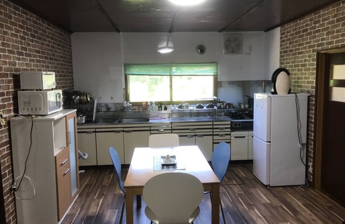 Asahikawa House | Airfield hill and patchwork hill valley house