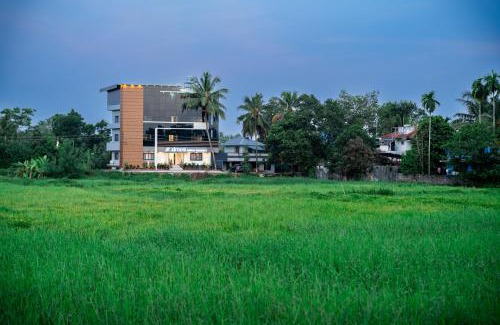 Alwaye Hotel | AIRNEST Airport Residency